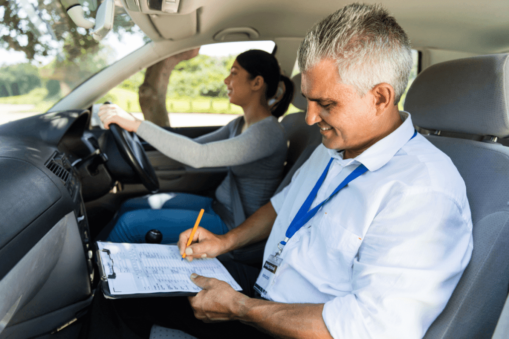 driving test calm driver with driving instructor sitting in the car