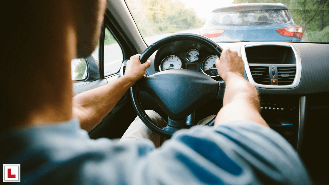 man driving in car after passing driving test UK