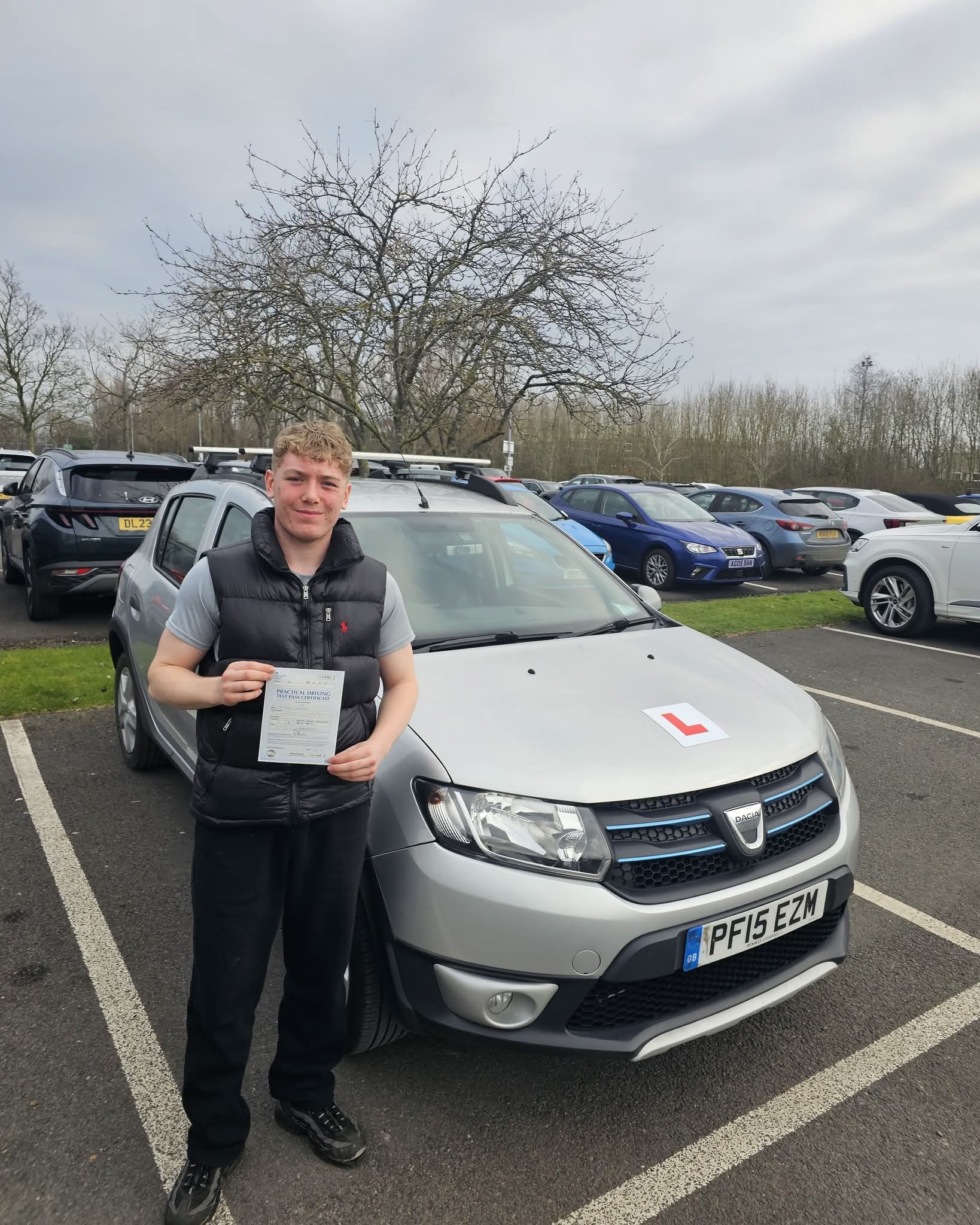 Learner celebrating a driving test pass with JNDS